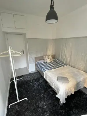 Łóżko lub łóżka w pokoju w obiekcie Apartament Metro Swiętokrzyska Pokoje Rooms