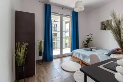 Łóżko lub łóżka w pokoju w obiekcie Geodezyjna '70 Cozy Rooms P2