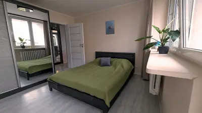 Łóżko lub łóżka w pokoju w obiekcie Sunny 3-room Appartement, Near National Stadium