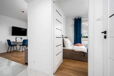 Łóżko lub łóżka w pokoju w obiekcie Warsaw Modern Stay