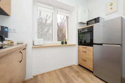 Kuchnia lub aneks kuchenny w obiekcie Spacious Apartment for 6 People Near the Old Town by Noclegi Renters