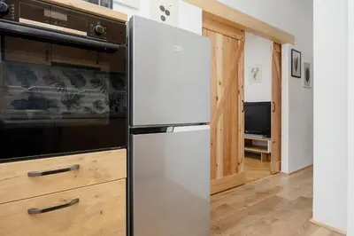 Kuchnia lub aneks kuchenny w obiekcie Spacious Apartment for 6 People Near the Old Town by Noclegi Renters