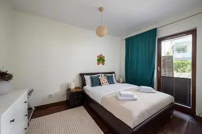 Łóżko lub łóżka w pokoju w obiekcie Las Kabacki Comfy Apartment by BookingHost