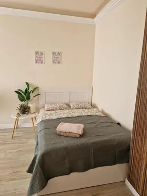 Łóżko lub łóżka w pokoju w obiekcie Apartment Mokotów