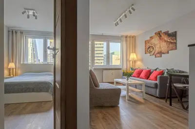 Łóżko lub łóżka w pokoju w obiekcie Vorto Apartament 4 - Warszawa Centrum