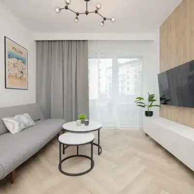 Przytulny Apartament z Parkingiem i Tarasem w Warszawie by Noclegi Renters