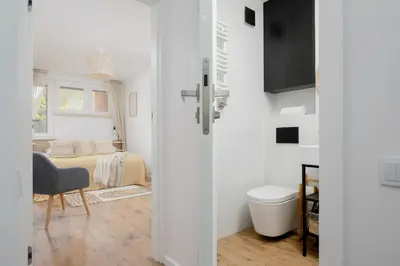 Łazienka w obiekcie Cozy Apartment near Royal Baths Park by Noclegi Renters