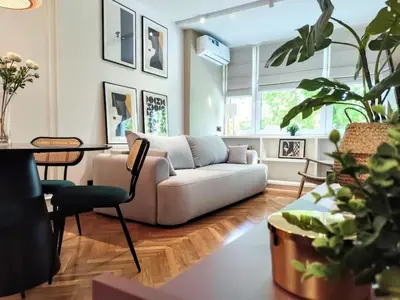 Część wypoczynkowa w obiekcie No. 8 / Nr 8 by Cooee Apartments