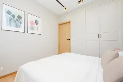 Łóżko lub łóżka w pokoju w obiekcie Bałuckiego Modern & Cozy Apartment Stary Mokotów Warsaw by Noclegi Renters