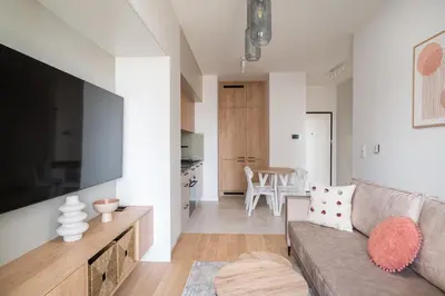 Telewizja i/lub zestaw kina domowego w obiekcie Grzybowska City View Apartments by BookingHost
