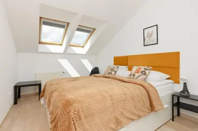 Łóżko lub łóżka w pokoju w obiekcie Family Apartment in Warsaw with 3 Bedrooms & AC near Metro Stokłosy by Noclegi Renters