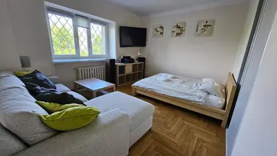 Łóżko lub łóżka w pokoju w obiekcie VipWarsawApartments pl Nowolipie near Old Town