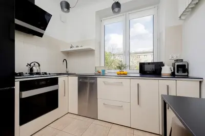 Kuchnia lub aneks kuchenny w obiekcie Beautiful & Modern Apartment near the City Center by Noclegi Renters