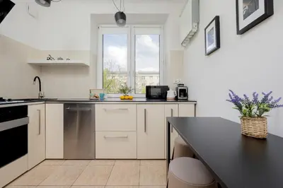 Kuchnia lub aneks kuchenny w obiekcie Beautiful & Modern Apartment near the City Center by Noclegi Renters