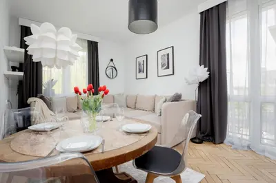 Część wypoczynkowa w obiekcie Beautiful & Modern Apartment near the City Center by Noclegi Renters