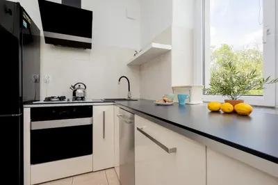 Kuchnia lub aneks kuchenny w obiekcie Beautiful & Modern Apartment near the City Center by Noclegi Renters