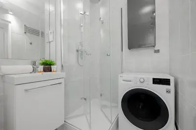 Łazienka w obiekcie Beautiful & Modern Apartment near the City Center by Noclegi Renters