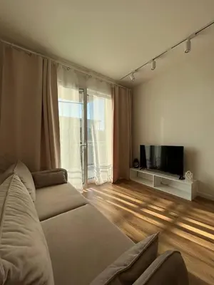 Telewizja i/lub zestaw kina domowego w obiekcie Apartamenty M1 z parkingiem podziemnym