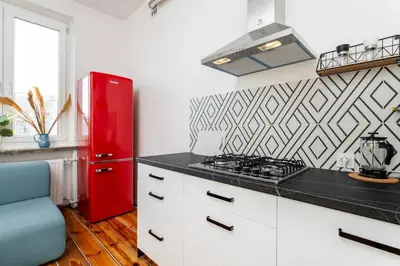 Kuchnia lub aneks kuchenny w obiekcie Peach Apartment Mokotow