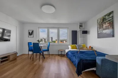 Telewizja i/lub zestaw kina domowego w obiekcie Warsaw Wola Studio - 9th Floor, City View - by Rentujemy