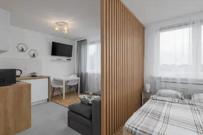 Łóżko lub łóżka w pokoju w obiekcie Reymonta 23 B - 5 min Metro - 15 min Centrum - 10 min CMKP