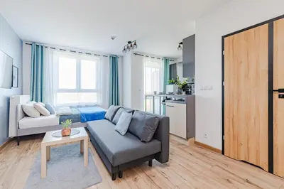 Część wypoczynkowa w obiekcie Wiktoryn 98 SuperApart - Nowoczesne studio