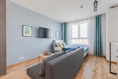Telewizja i/lub zestaw kina domowego w obiekcie Wiktoryn 98 SuperApart - Nowoczesne studio