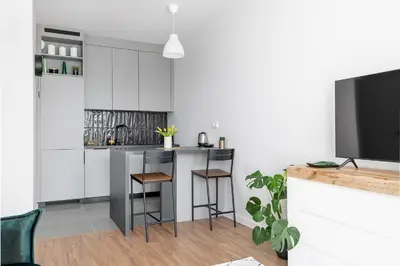 Kuchnia lub aneks kuchenny w obiekcie RentPlanet - Apartament Ludwiki
