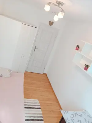 Łóżko lub łóżka w pokoju w obiekcie 209 Warsaw Center Tamars