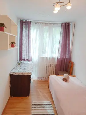 Łóżko lub łóżka w pokoju w obiekcie 209 Warsaw Center Tamars