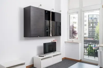 Telewizja i/lub zestaw kina domowego w obiekcie Elektrownia Powiśle Comfort Studio by BookingHost