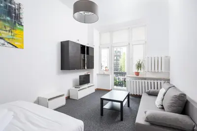 Telewizja i/lub zestaw kina domowego w obiekcie Elektrownia Powiśle Comfort Studio by BookingHost