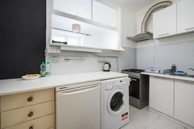 Kuchnia lub aneks kuchenny w obiekcie Plac Wilsona Comfort Apartment by BookingHost