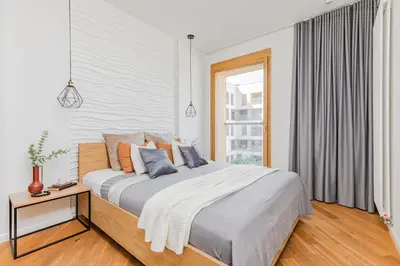 Łóżko lub łóżka w pokoju w obiekcie SuperApart Kolejowa 49a - Blisko centrum i metra