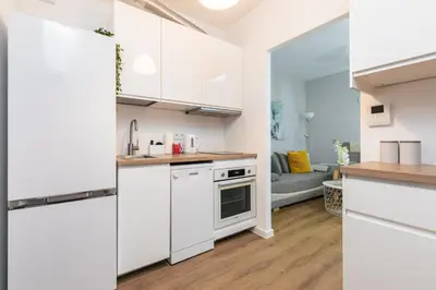 Kuchnia lub aneks kuchenny w obiekcie SuperApart Wileńska Studio z parkingiem