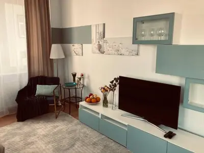 Telewizja i/lub zestaw kina domowego w obiekcie Studio Centrum