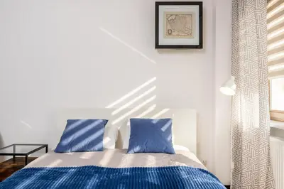 Łóżko lub łóżka w pokoju w obiekcie Peanut Premium Apartment Ochota