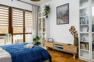 Łóżko lub łóżka w pokoju w obiekcie Peanut Premium Apartment Ochota