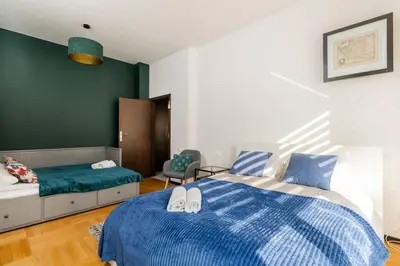 Łóżko lub łóżka w pokoju w obiekcie Peanut Premium Apartment Ochota