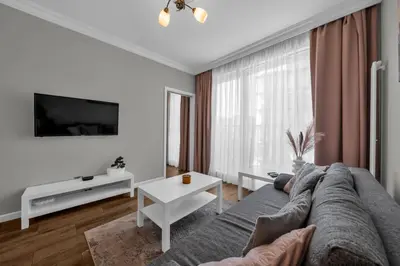 Telewizja i/lub zestaw kina domowego w obiekcie Mokotów Apartment - Park, Metro & Shops nearby - by Rentujemy