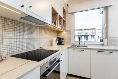 Kuchnia lub aneks kuchenny w obiekcie Deer Park Residence Mokotow