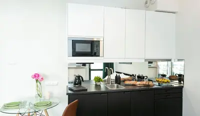 Kuchnia lub aneks kuchenny w obiekcie Chłodna 22a - Duży taras - large terrace - Bezpłatny parking - free parking - Better Rental