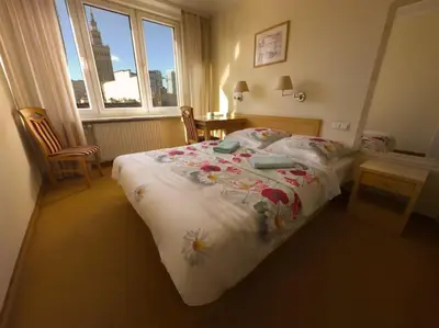 Łóżko lub łóżka w pokoju w obiekcie 10Q - Z6 Apartament 603A
