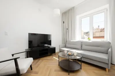 Telewizja i/lub zestaw kina domowego w obiekcie Heart of the Old Town Royal Apartments by Noclegi Renters