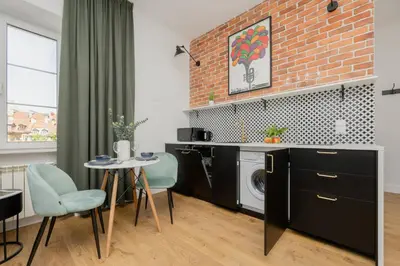 Kuchnia lub aneks kuchenny w obiekcie Heart of the Old Town Royal Apartments by Noclegi Renters