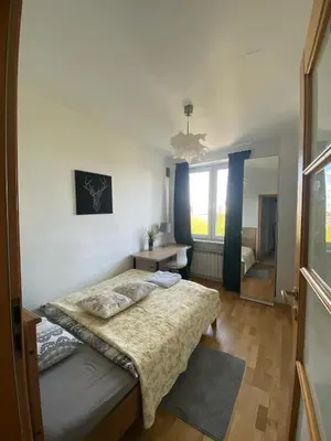 Łóżko lub łóżka w pokoju w obiekcie Appartement dans le centre avec une vue imprenable