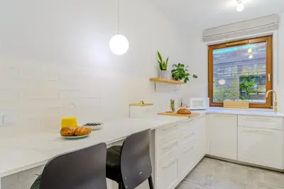 Kuchnia lub aneks kuchenny w obiekcie P&O Apartments Grzybowska I