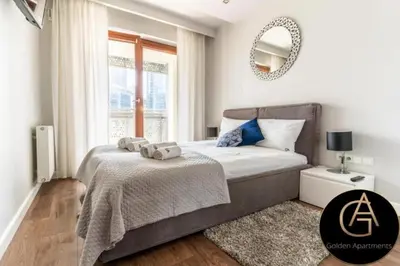 Łóżko lub łóżka w pokoju w obiekcie Urban Apartaments - Great Location - City Center - Wronia 45