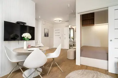 Telewizja i/lub zestaw kina domowego w obiekcie Urban Apartaments - Great Location - City Center - Giełdowa 4A
