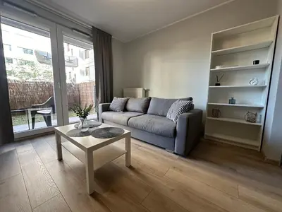 Część wypoczynkowa w obiekcie Cosy apartment near to the Chopin's airport Cybernetyki 2C